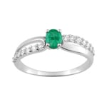Bague or gris 750/18 ct avec émeraude ovale et zircones