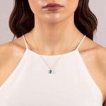 Pendant 750/18 K Yellow Gold with oval Blue Topaz and Diamonds 0.03 ct H/si - AN-52403-TOP-GG