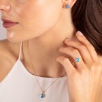 Pendant 750/18 K Yellow Gold with oval Blue Topaz and Diamonds 0.03 ct H/si - AN-52403-TOP-GG