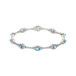 Armband 750/18 K Weissgold mit Diamanten 0.11 ct H/si & Blautopasen