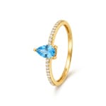 Bague solitaire pavé or jaune 375/9 ct avec topaze bleue & zircones