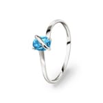 Bague or gris 375/9 ct avec topaze bleue ovale