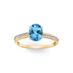 Damenring 750/18 K Gelbgold mit Blautopas oval und Diamanten 0.09 ct H/si - RI-52691-TOP-GG