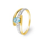 Bague 750/18 K or jaune avec topaze bleue ovale & zircones