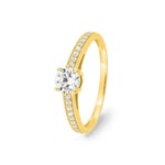 Bague 750/18 K or jaune avec zircones solitaires accompagnés
