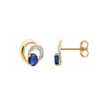 Clous d'oreilles or jaune 750/18 ct avec saphir 0.44ct.