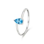 Bague solitaire poire or gris 375/9 ct avec topaze bleue