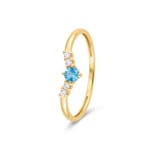 Bague or jaune 750/18 ct avec topaze bleue & diamants 0.05 ct