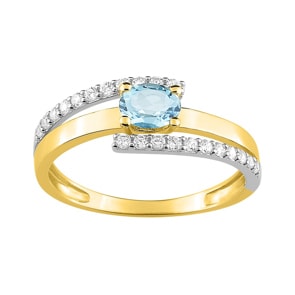 Bague or jaune 750/18 ct avec topaze bleue ovale et zircones