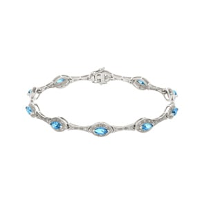 Bracelet or gris 750/18 ct avec diamants 0.11 ct H/si & topazes bleues