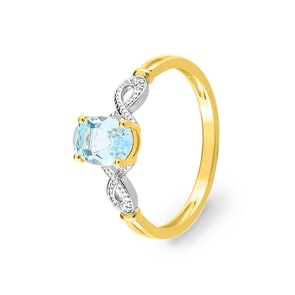 Ring 750/18 K Yellow Gold Two-tone with oval Blue Topaz & Diamonds 0.01ct.