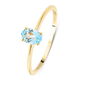 Bague or jaune 750/18 ct avec topaze bleue ovale