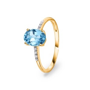 Bague or jaune 750/18 ct avec topaze bleue ovale et diamants 0.02 ct H/si