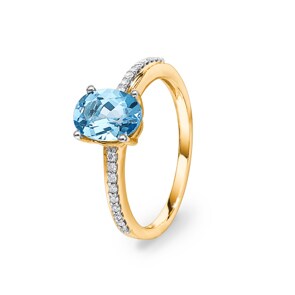 Bague or jaune 750/18 ct avec topaze bleue ovale et diamants 0.09 ct H/si