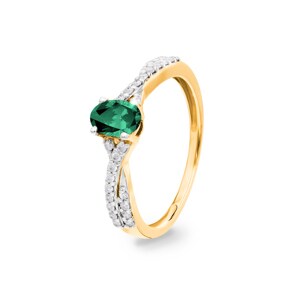 Bague or jaune 750/18 ct avec émeraude ovale et diamants 0.13 ct H/si