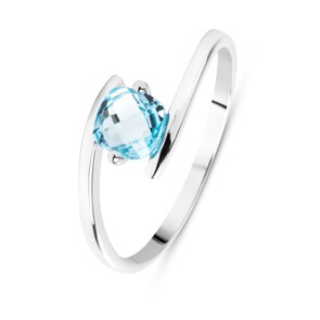 Bague or gris 750/18 ct avec topaze bleue coussin