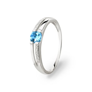 Bague or gris 750/18 ct avec topaze bleue ronde