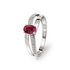 Damenring 750/18 K Weissgold mit Rubin 0.62ct. und Diamanten 0.02ct.
