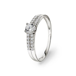Bague or gris 750/18 ct avec zircones solitaires accompagnés