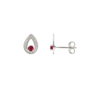 Clous d'oreilles or gris 750/18 ct avec émeraude