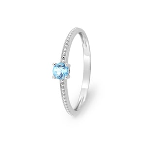 Solitärring 750/18 K Weissgold mit Blautopas rund